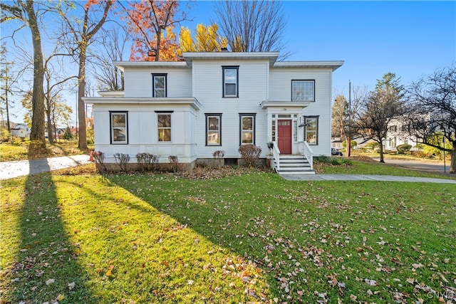 view of front of home featuring a front lawn