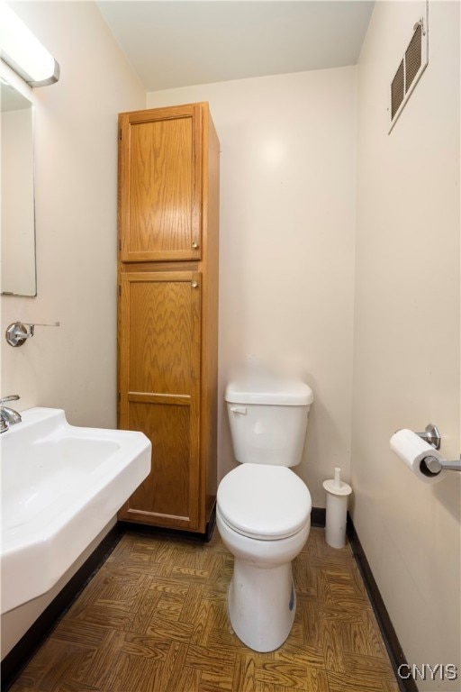 bathroom featuring toilet