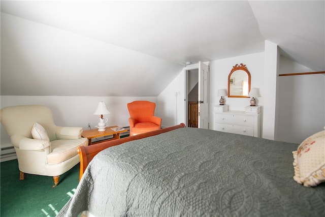 carpeted bedroom with lofted ceiling