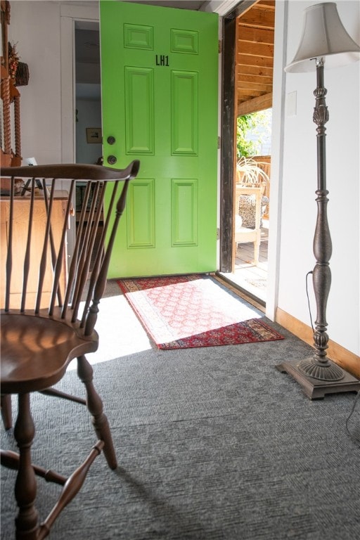 view of carpeted foyer