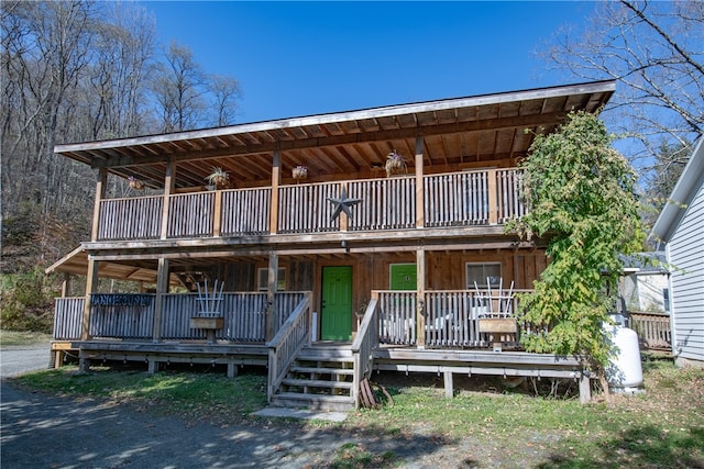 view of front of house with a wooden deck