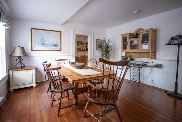 dining space with dark wood-type flooring