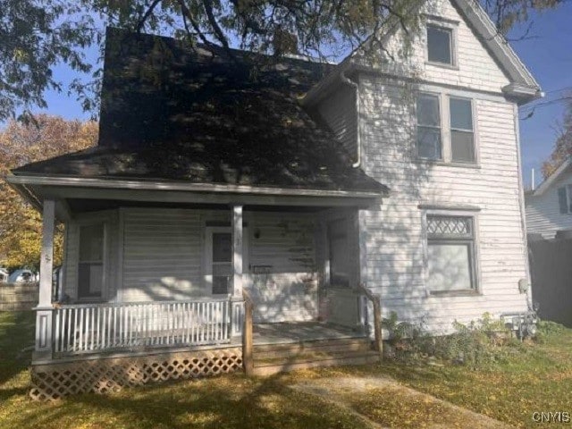 view of front of home featuring covered porch