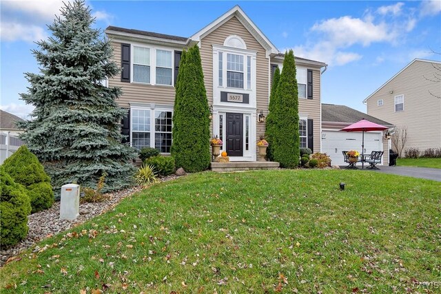 view of front of home with a front yard