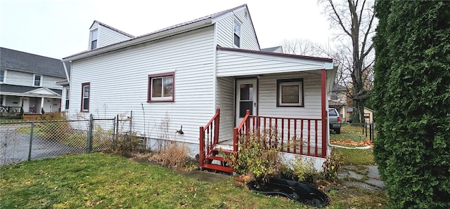 exterior space with a front lawn