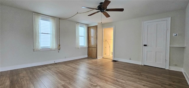 unfurnished bedroom with hardwood / wood-style floors and ceiling fan