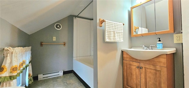 bathroom featuring vanity, shower / tub combination, lofted ceiling, and a baseboard heating unit