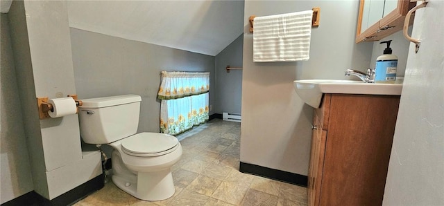 bathroom with vanity, a baseboard radiator, toilet, and lofted ceiling