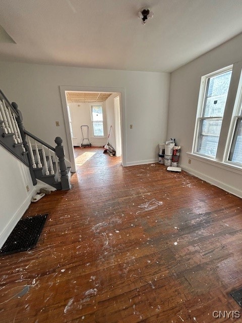 interior space featuring dark hardwood / wood-style floors and a healthy amount of sunlight