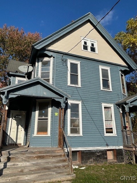 rear view of house with a deck