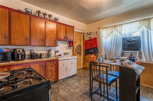 kitchen featuring black stove