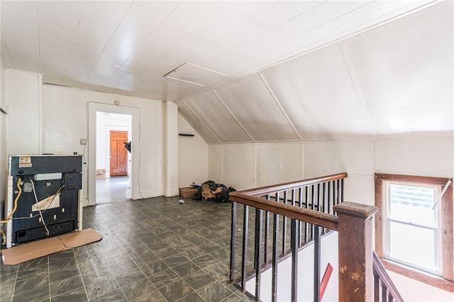 bonus room featuring lofted ceiling