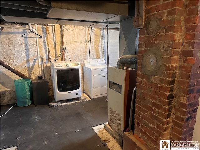 basement with washing machine and dryer