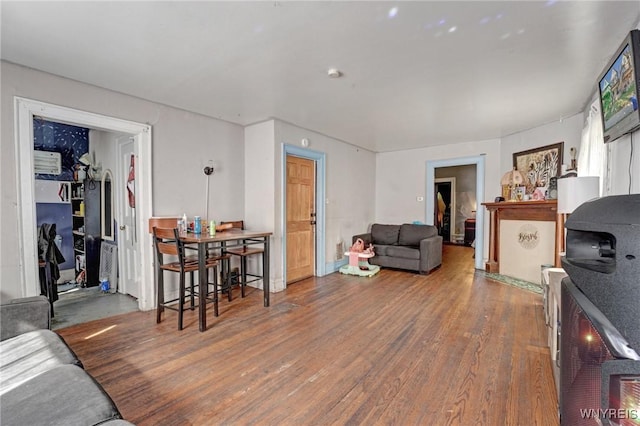 living room featuring dark hardwood / wood-style floors