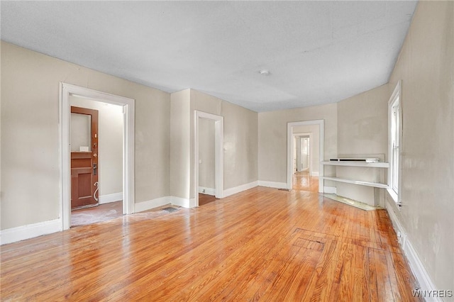 empty room with light wood-type flooring