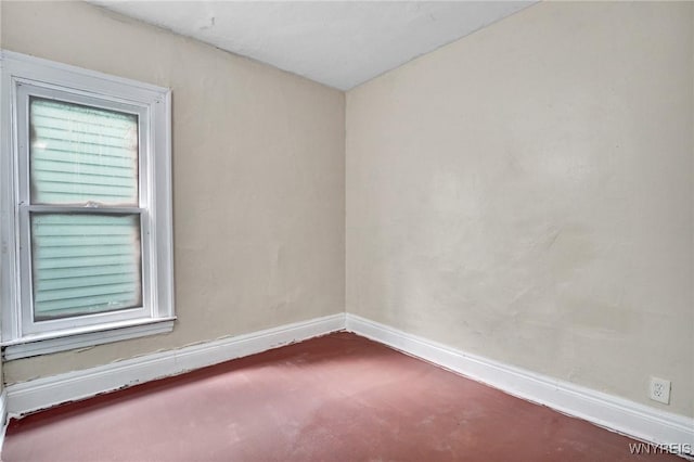 spare room featuring carpet flooring