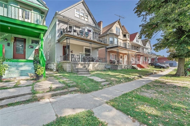 view of property featuring a porch