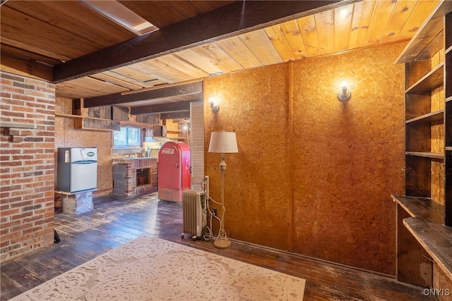 interior space with wood ceiling, white fridge, and dark hardwood / wood-style flooring