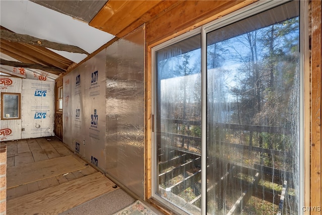 entryway featuring vaulted ceiling