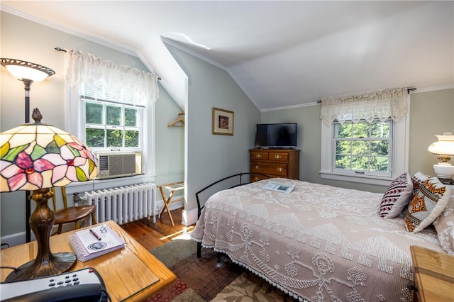 948 George St, Wheatland, NY 14511 - bedroom featuring radiator heating unit, multiple windows, wood finished floors, crown molding, and lofted ceiling