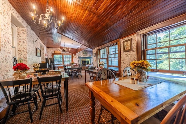 948 George St, Wheatland, NY 14511 - dining room featuring wallpapered walls, a chandelier, wood ceiling, vaulted ceiling, and carpet