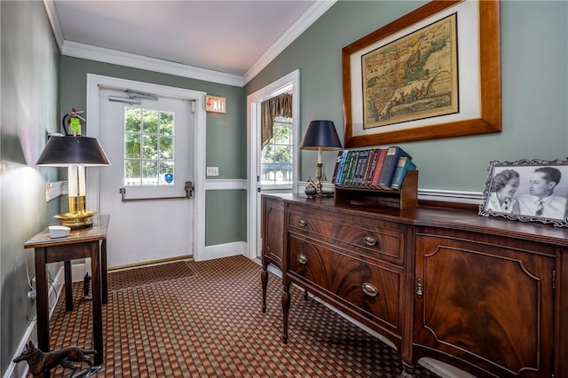 948 George St, Wheatland, NY 14511 - foyer entrance featuring dark carpet, crown molding, and baseboards