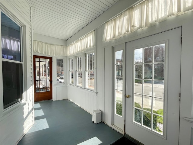 sunroom / solarium featuring plenty of natural light