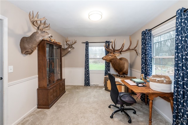 office area with light colored carpet