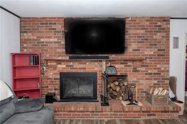 details with a fireplace and hardwood / wood-style flooring