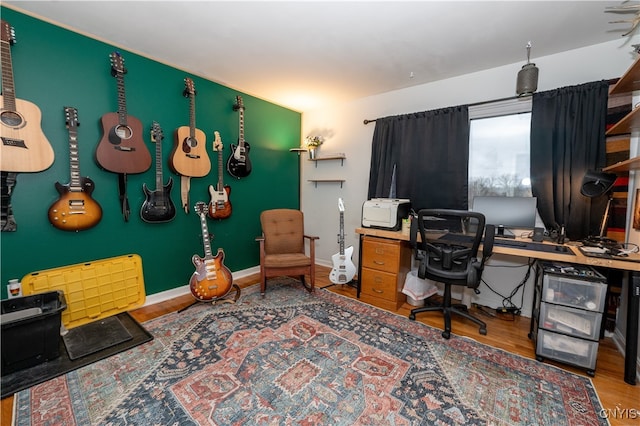 office with hardwood / wood-style flooring