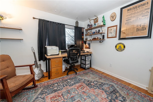 office space with hardwood / wood-style floors