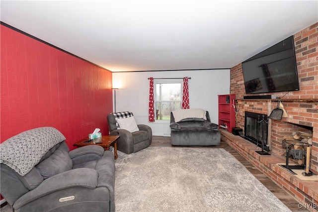 living room featuring a fireplace and hardwood / wood-style flooring