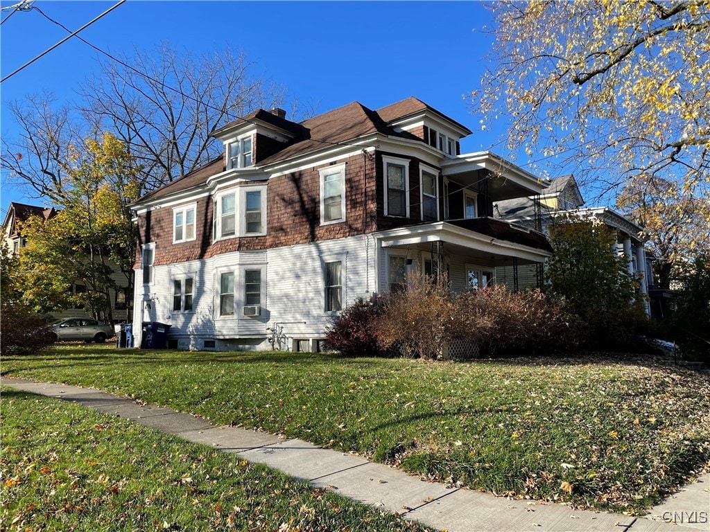 view of home's exterior featuring a lawn