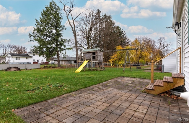 view of patio featuring a playground