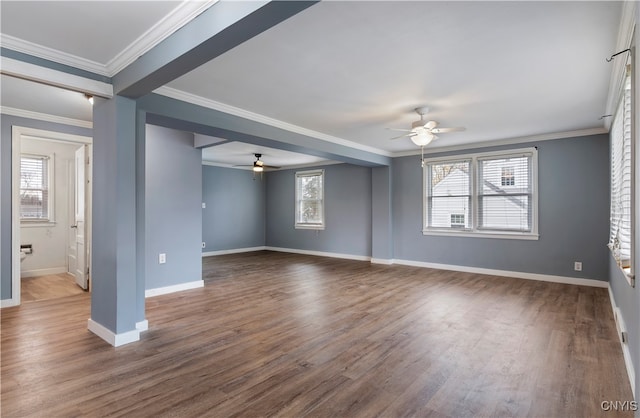 interior space with hardwood / wood-style flooring, plenty of natural light, and ornamental molding