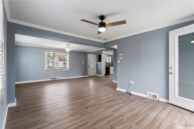 unfurnished living room with crown molding, hardwood / wood-style flooring, and ceiling fan