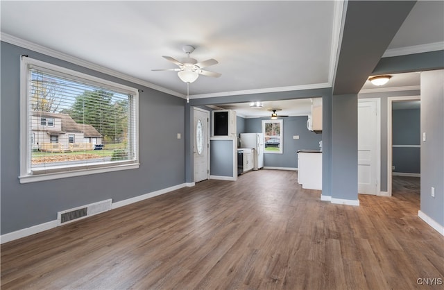 unfurnished living room featuring ornamental molding, wood-type flooring, and ceiling fan