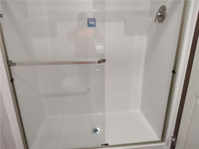 bathroom featuring walk in shower