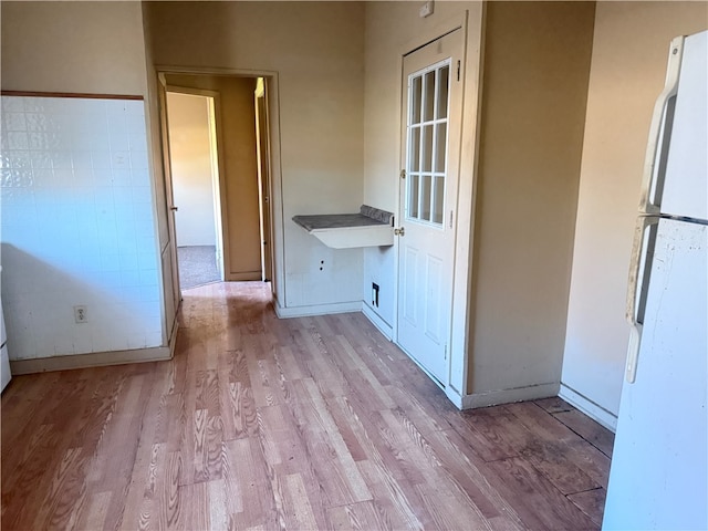 interior space with light hardwood / wood-style floors