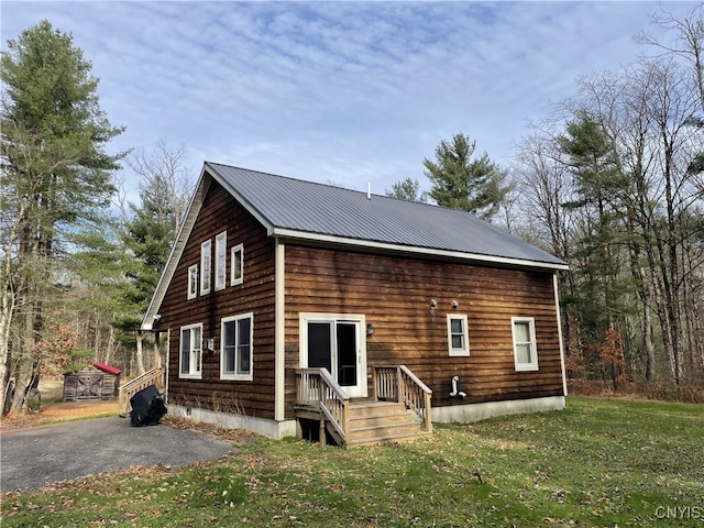 exterior space featuring a yard