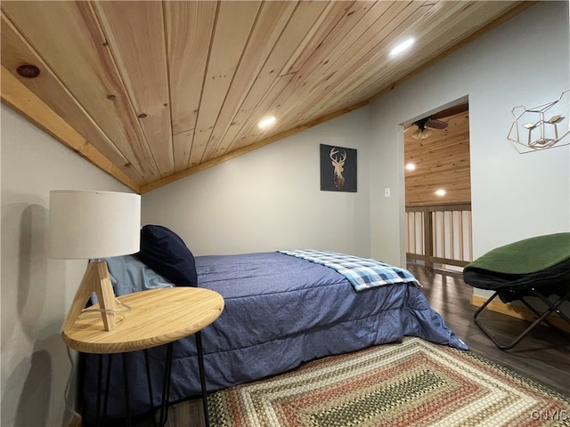 bedroom featuring lofted ceiling, hardwood / wood-style flooring, and wood ceiling