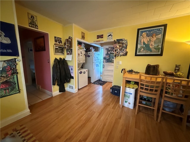 office featuring wood-type flooring and crown molding