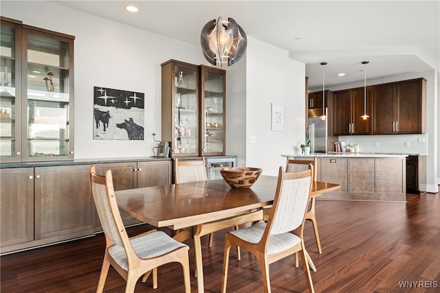 dining area featuring dark hardwood / wood-style floors