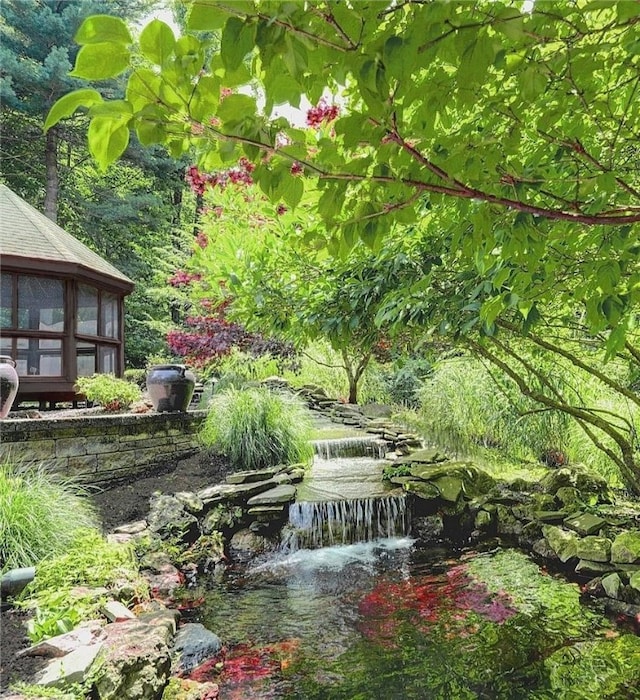 view of yard with a water view