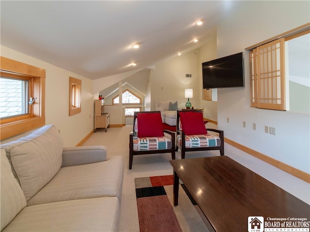 living room with light carpet and lofted ceiling