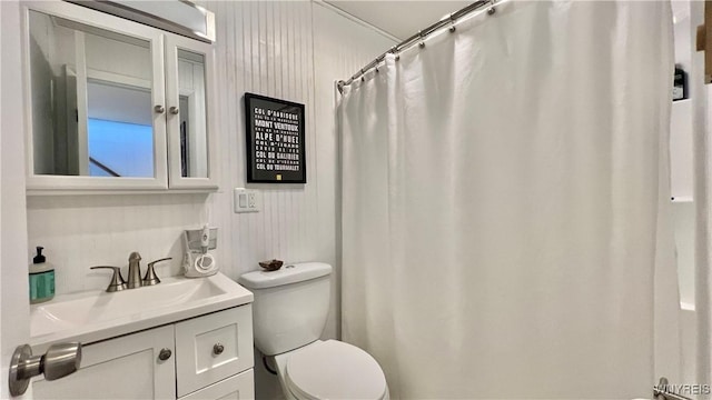 full bathroom with vanity and toilet