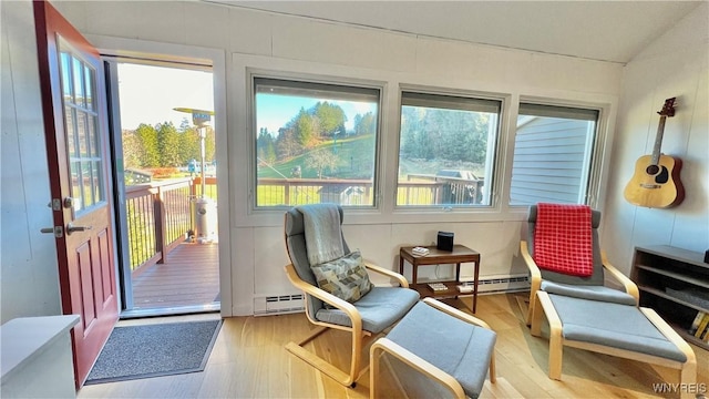 sunroom featuring baseboard heating