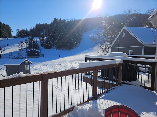 view of snow covered deck