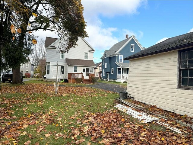 view of yard with a wooden deck