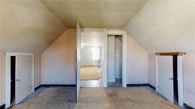 bonus room featuring vaulted ceiling